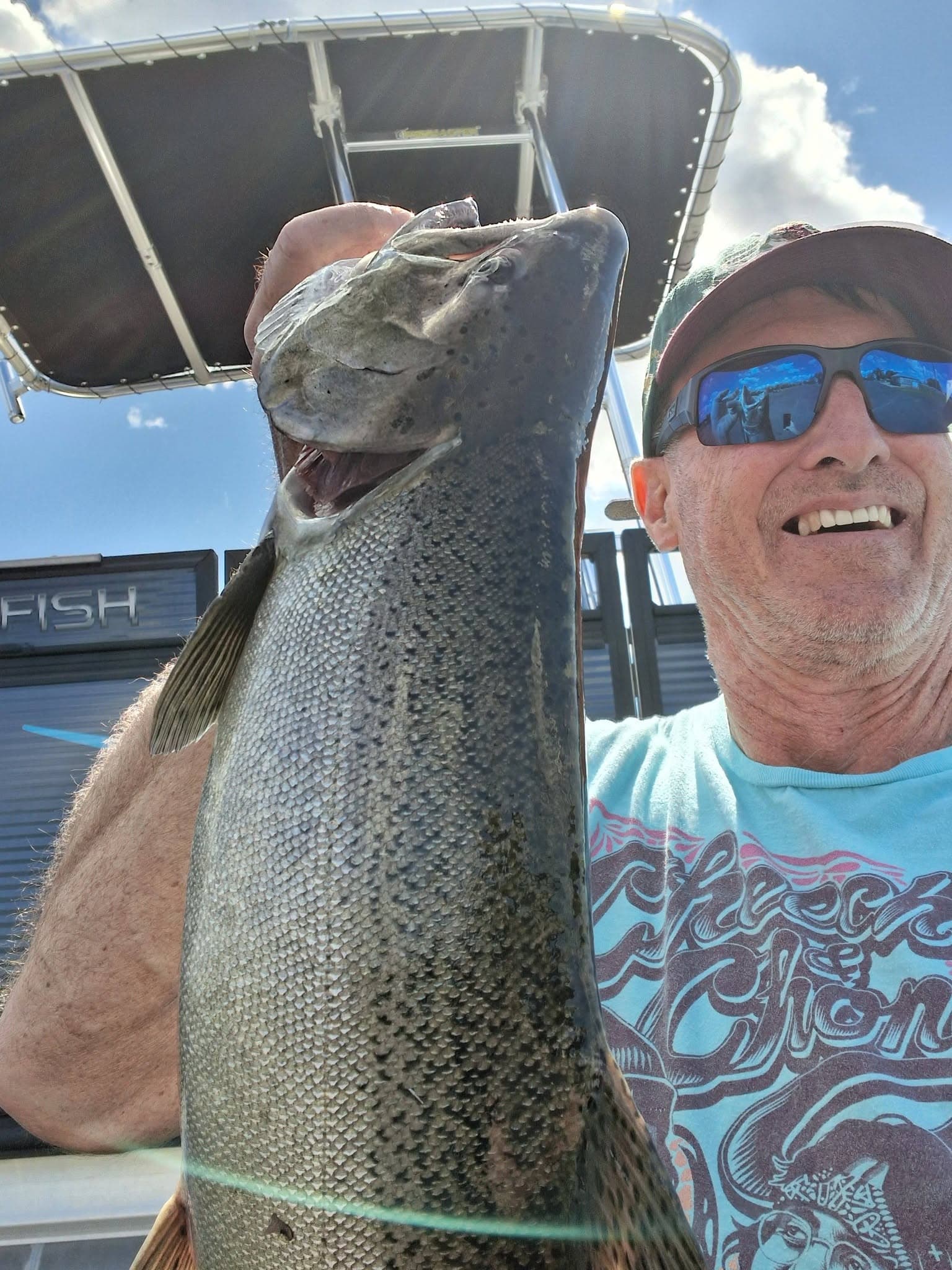 A relaxed, guided Southwest Michigan fishing charter aboard a 24-foot Angler Quest tritoon with gear included and local water knowledge leading the route.